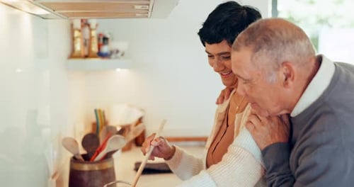 Food, laughing and a senior couple in the kitchen together, bonding while in their home to prepare