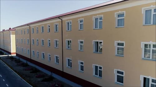 Apartment Building Exterior From An Aerial View