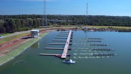 Rowing Teams Practice on Lake from Aerial View