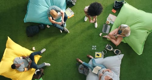 People Playing with Drone in Modern Workplace