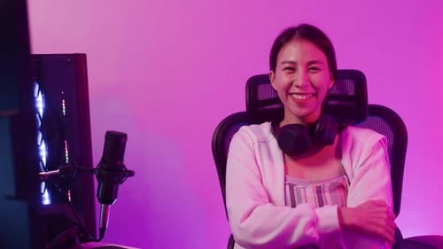 Excited Woman Gaming and Streaming at Home