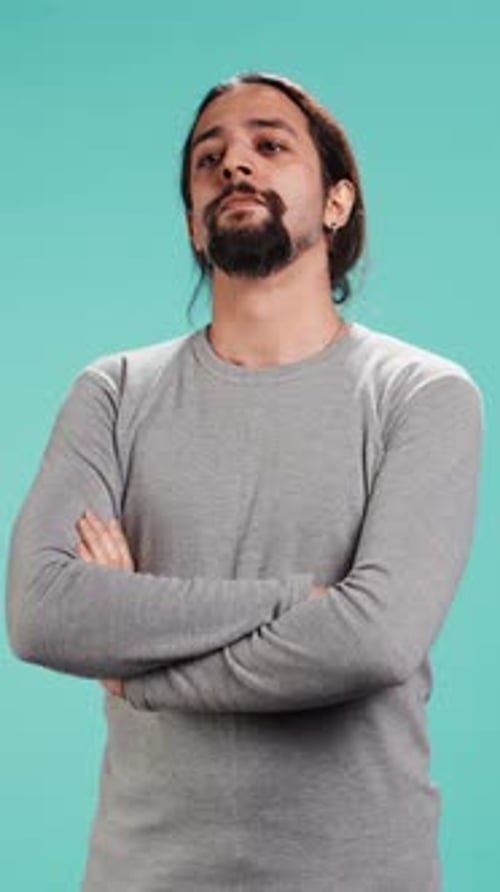 Man with Long Hair Posing Arms Crossed