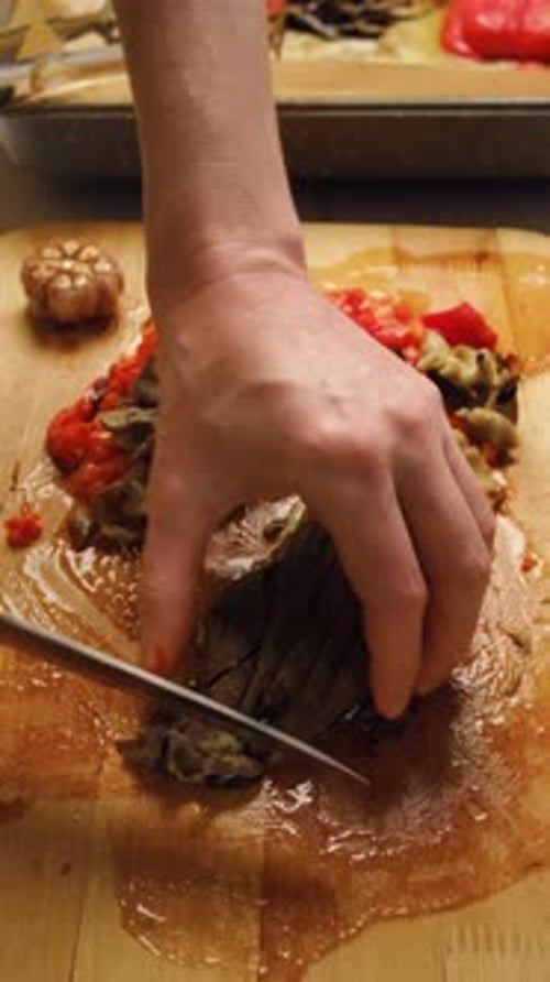 Preparing Roasted Vegetables, Dicing Eggplant on Cutting Board