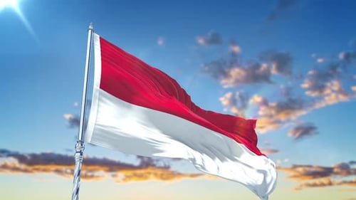 Realistic Waving Flag of Indonesia Against Blue Sky