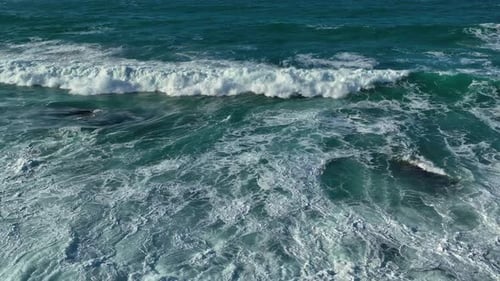Breathtaking Slow Motion View Of Ocean Waves Crawling In Foamy Surface. Aerial Shot