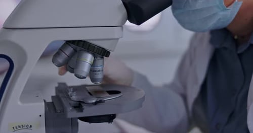 Close Up of Microscope in Bright Lab