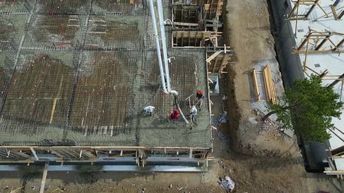 Aerial View of Construction Site Concrete Pouring