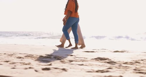 Talking, date and a couple walking on the beach for an anniversary, cardio or holiday