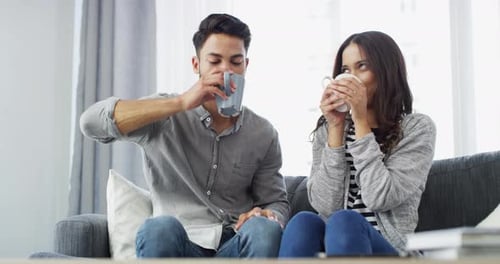 Loving Couple Drinking Coffee Together at Home