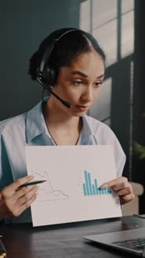 Young Woman Presents Business Data During Online Meeting
