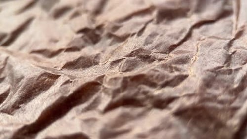 Rotation Brown Crumpled Paper Background