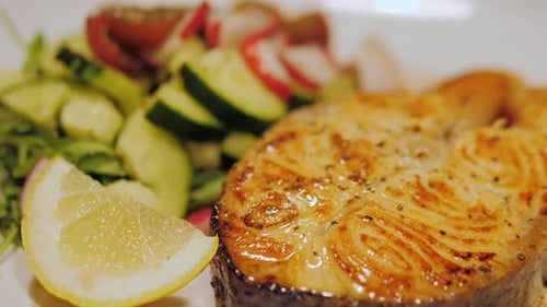 Cooked Salmon with Salad Close Up