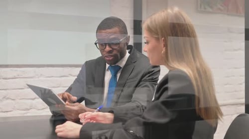 Business Meeting With Tablet Discussion in Workplace