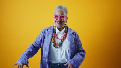 Funny senior woman wearing fashionable clothes
