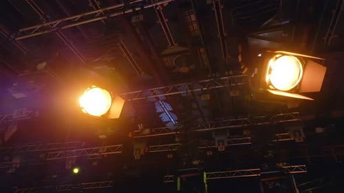 Flashing studio lights equipment on the ceiling of a TV set
