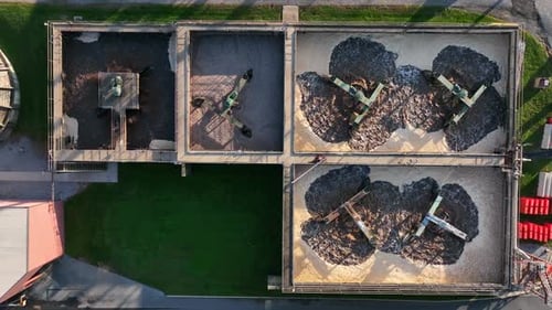 Water treatment sewage and wastewater at factory plant. Manufacturing facility in USA. Dirty brownwa