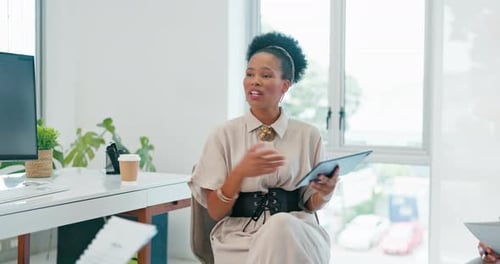 Woman Holding Tablet in Modern Business Office