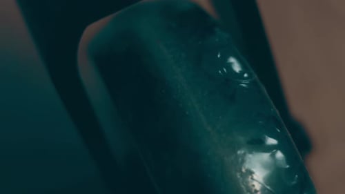 Close Up of Green and Black Rectangular Object