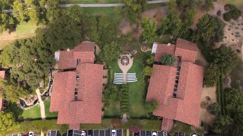 An Aerial View of a Stunningly Beautiful Wedding Venue Located Near a Scenic Golf Course