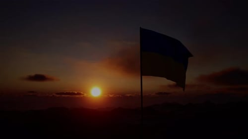 Ukrainian Flag Waving at Colorful Sunset