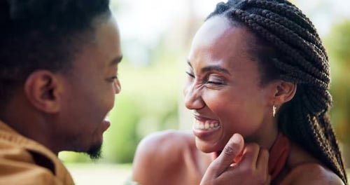 Smiling Couple Enjoying a Romantic Date Outdoors
