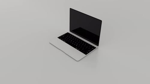 A white laptop with a green screen on a white background. Laptop opens green chroma key display