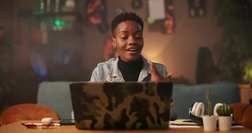 Young Adult Engaged in Video Call at Home