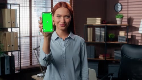 Happy Smiling Caucasian Business Woman Showing Green Screen Mobile Phone Display Smartphone App