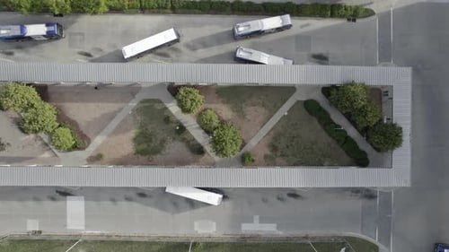 busses departing the station, depot, bus stop, rush hour early morning