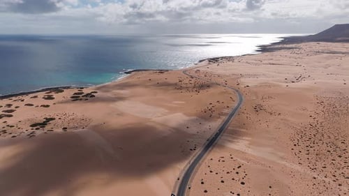 Aerial Coastal Desert Road and Volcanic Cone Fuerteventura Canary Islands