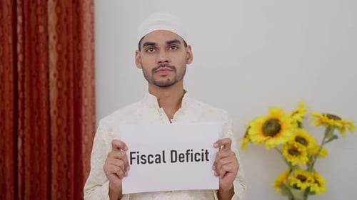 Muslim Man Holding Fiscal Deficit Poster