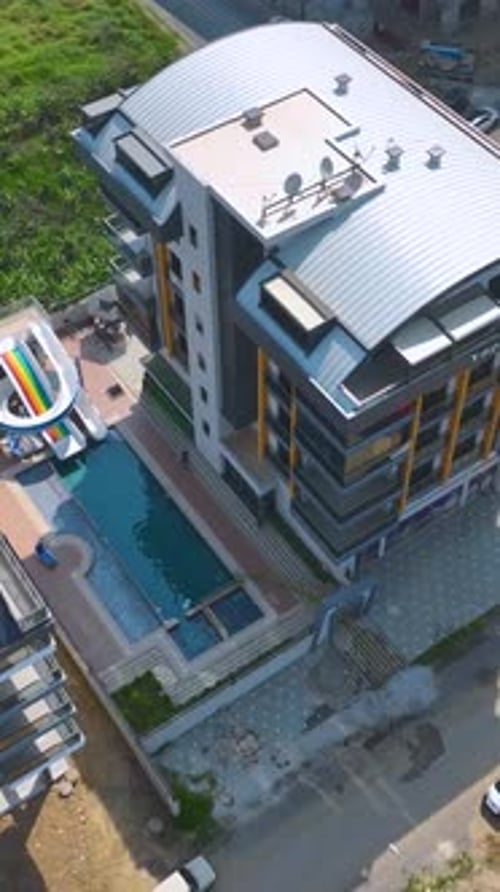 Vertical Video Home Pool Filling With Water in a Peaceful Residential Setting