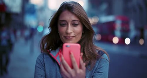 Adults Using Phones in Urban Setting