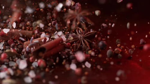 Variety of Spices Falling Onto Surface in . with Phantom