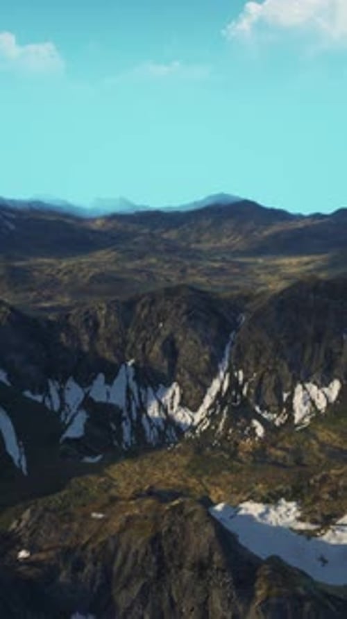 A View of a Mountain Range From a Plane