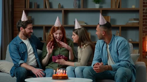 Friends Celebrate Birthday With Cake and Gift