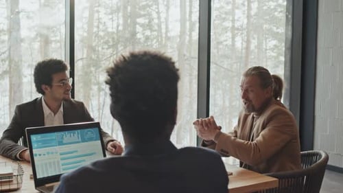 Happy Startup Team Doing High Fives at Office Meeting