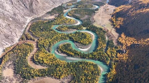 Meandering river in a scenic autumn mountain valley