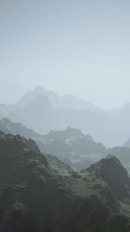 A Misty Mountain Range Engulfed in Fog