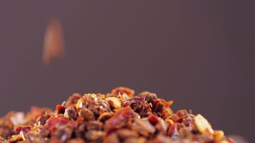 Pouring Spicy Red Chili Peppers in Close Up
