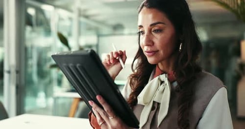 Woman, UI designer and thinking with tablet for website, planning or app development in creative