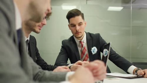 Collaborative Meeting of Business Professionals in Modern Office