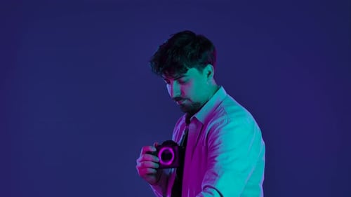 Backstage Photographer in Studio Shooting with Camera