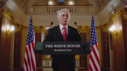 Man at Podium in Washington D.C. Giving Speech