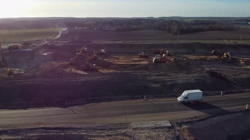 Heavy machinery working on suburban real estate development project
