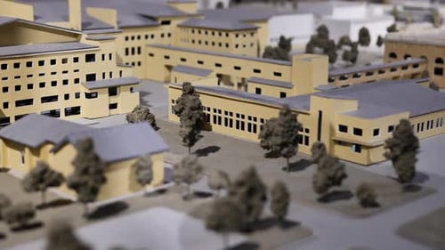 Architectural Model of a Residential Complex Featuring Miniature Buildings and Trees