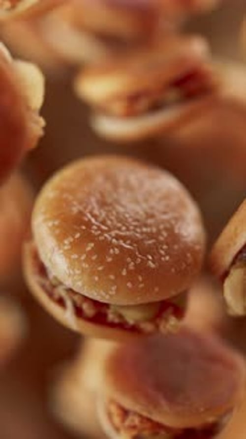 Animation of a group of burgers. Defocus. Close-up.