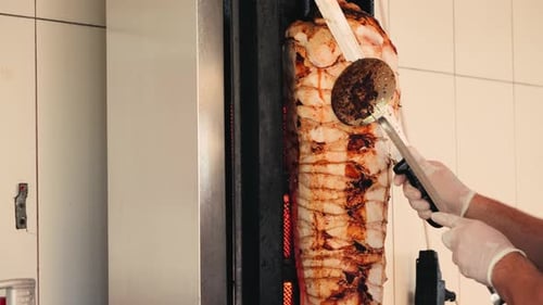 Grilled Meat Close Up Footage Cooking Traditional Turkish Kebab Meat Doner Shawarma or Gyros