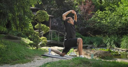 Healthy African American Man Exercising Ar Park Outdoor Practicing Yoga