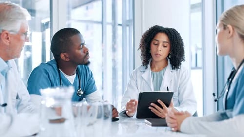 Medical Team Meeting in a Modern Office